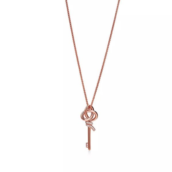 Tiffany S925 silver necklace plated with 18K gold in a knot and key design - Image 2