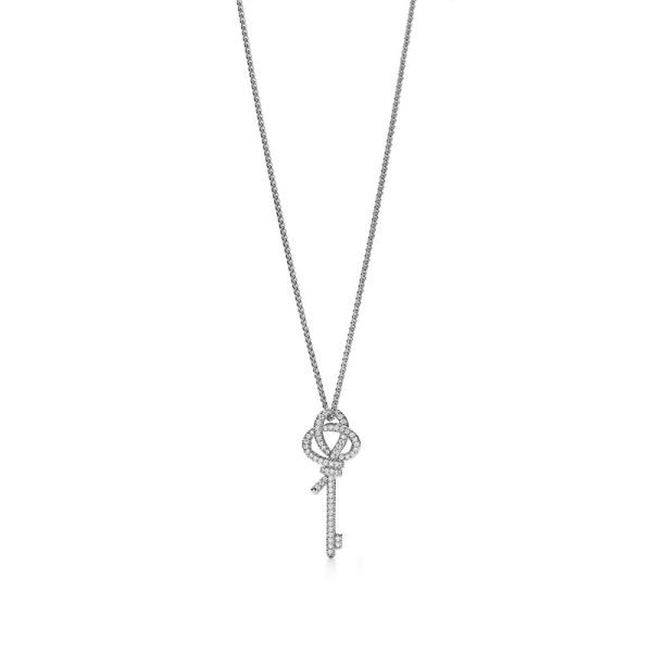 Tiffany S925 silver necklace plated with 18K gold in a knot and key design - Image 5
