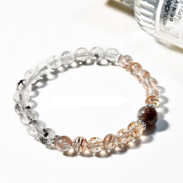 Natural black gold Super Seven single-strand bracelet paired with Herkimer diamond, mainly for the third chakra and backbone. It's a versatile and fashionable jewelry bead bracelet for women